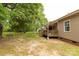 Spacious backyard featuring a deck, wooded views, and plenty of room for activities at 2818 Neill Rd, Lancaster, SC 29720