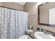 Bathroom featuring a vanity with a sink, a decorative mirror, and a shower with a curtain at 2818 Neill Rd, Lancaster, SC 29720