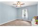 Serene bedroom with carpet floors, a ceiling fan, and plenty of natural light at 2818 Neill Rd, Lancaster, SC 29720