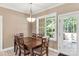 Inviting dining room with a wooden table, chandelier, and lots of natural light at 2818 Neill Rd, Lancaster, SC 29720