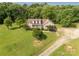 Attractive home with a welcoming porch, set amidst a spacious green lawn and natural surroundings at 2818 Neill Rd, Lancaster, SC 29720