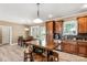 Open kitchen and dining area with hardwood floors, a kitchen island, and stainless steel appliances at 2818 Neill Rd, Lancaster, SC 29720