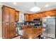 Modern kitchen with stainless steel appliances, granite countertops, and a large island at 2818 Neill Rd, Lancaster, SC 29720