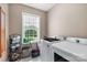 Well-equipped laundry room with modern appliances and natural light at 2818 Neill Rd, Lancaster, SC 29720