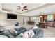 Spacious living room featuring hardwood floors, a ceiling fan, a flat screen TV, and a comfortable couch at 2818 Neill Rd, Lancaster, SC 29720