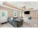 Cozy living room features hardwood floors, comfortable seating, and a bright window at 2818 Neill Rd, Lancaster, SC 29720