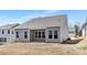 New construction featuring a spacious backyard and a covered patio at 3128 Spring Iris Dr, Denver, NC 28037