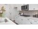 Well-appointed kitchen with stainless steel appliances, sleek countertops, and ample cabinet space at 3128 Spring Iris Dr, Denver, NC 28037