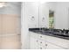 Bathroom with double sink vanity with a dark countertop, and plenty of storage space at 3204 Mcpherson St, Waxhaw, NC 28173