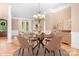 Dining room featuring an elegant chandelier, table, and neutral decor at 3204 Mcpherson St, Waxhaw, NC 28173