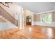 Spacious foyer with hardwood floors, staircase, and natural light at 3204 Mcpherson St, Waxhaw, NC 28173