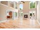 Spacious living room boasting high ceilings, fireplace, and abundant natural light at 3204 Mcpherson St, Waxhaw, NC 28173