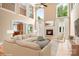 Living room features a fireplace, hardwood floors, and plenty of natural light at 3204 Mcpherson St, Waxhaw, NC 28173
