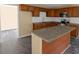 Modern kitchen includes granite counters, island, stainless appliances, and new cabinets at 3209 Lowell Rd, Gastonia, NC 28054