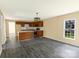 Bright, eat-in kitchen featuring granite counters, center island, and stainless steel appliances at 3209 Lowell Rd, Gastonia, NC 28054
