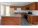 Updated kitchen includes granite counters, stainless steel appliances, and an island at 3209 Lowell Rd, Gastonia, NC 28054