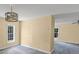 Spacious living room featuring neutral walls, gray floors, and natural light offering a bright and welcoming atmosphere at 3209 Lowell Rd, Gastonia, NC 28054