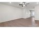 Bright living room with vinyl flooring, neutral walls, ceiling fan, and recessed lighting at 3323 Burberry Dr, Gastonia, NC 28052