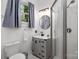 Modern bathroom featuring a glass-enclosed shower and sleek vanity at 34 Admiral Sw Ave, Concord, NC 28027