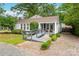 Charming single-story home featuring a welcoming front porch and a convenient access ramp at 34 Admiral Sw Ave, Concord, NC 28027