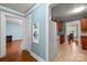 Home interior showing transition from entrance to living room and kitchen at 34 Admiral Sw Ave, Concord, NC 28027