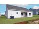 Spacious backyard with a sliding glass door and ample space for outdoor activities and relaxation at 3475 Saddlebred Dr, Gastonia, NC 28052