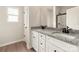 Bathroom features double sinks, granite countertops, and modern fixtures at 3475 Saddlebred Dr, Gastonia, NC 28052