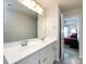 A full bathroom featuring double sinks, vanity with storage, and access to the bedroom at 403 Park Meadows Dr, Matthews, NC 28104