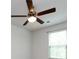 A bedroom featuring a ceiling fan, window and carpet flooring at 403 Park Meadows Dr, Matthews, NC 28104
