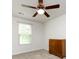 A bright bedroom with carpet, neutral walls, and a window bringing in tons of natural light at 403 Park Meadows Dr, Matthews, NC 28104