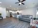 Open-concept living area flows into kitchen, featuring modern appliances, seating and seamless entertaining at 403 Park Meadows Dr, Matthews, NC 28104