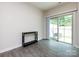 Bright room with sliding doors to patio to enjoy the outside with seating and greenery at 403 Park Meadows Dr, Matthews, NC 28104