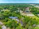 Wide aerial view showing property location within a neighborhood with plenty of trees at 409 Scaleybark Rd, Charlotte, NC 28209