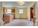 Eat-in kitchen featuring ample counter space and wood cabinets at 409 Scaleybark Rd, Charlotte, NC 28209