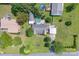 Aerial view of a house with a pool, carport, lush greenery and well-maintained landscaping at 500 Belleview Rd, Rock Hill, SC 29730