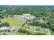 A beautiful aerial view shows the surrounding neighborhood, including Bellevue Elementary and Downtown Rock Hill in the distance at 500 Belleview Rd, Rock Hill, SC 29730