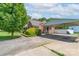 Side angle of a brick home with a covered carport and driveway at 500 Belleview Rd, Rock Hill, SC 29730