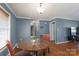 Dining area features natural light, hardwood floors, and seating for two at 500 Belleview Rd, Rock Hill, SC 29730