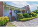 Close up of a charming brick home with a welcoming front porch and landscaped walkway at 500 Belleview Rd, Rock Hill, SC 29730