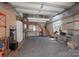 Unfinished garage featuring stairs and storage areas at 500 Belleview Rd, Rock Hill, SC 29730