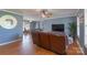 Open-concept living room featuring hardwood floors, ceiling fan, and contemporary furnishings at 500 Belleview Rd, Rock Hill, SC 29730