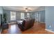Bright living room with hardwood floors, ceiling fan, and access to other areas of the home at 500 Belleview Rd, Rock Hill, SC 29730