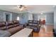 Inviting living area with hardwood floors, ceiling fan, and a view to the dinning room at 500 Belleview Rd, Rock Hill, SC 29730