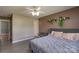 Spacious primary bedroom featuring a ceiling fan, natural light, and wood-look flooring at 500 Belleview Rd, Rock Hill, SC 29730
