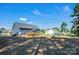 Photo of a backyard with a shed, landscaping, trees, and grassy area, perfect for outdoor activities and enjoying the scenery at 5016 Old Pine Ln, Cherryville, NC 28021