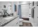 Bathroom with granite vanity, framed mirror, and a bathtub-shower combo at 5016 Old Pine Ln, Cherryville, NC 28021