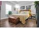 Serene bedroom with hardwood floors, natural light, and stylish decor at 5016 Old Pine Ln, Cherryville, NC 28021