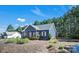 Attractive home in a peaceful setting featuring a cozy front porch and nicely landscaped surroundings at 5016 Old Pine Ln, Cherryville, NC 28021
