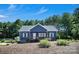 This appealing home has a cozy front porch, neat landscaping, and a well-maintained lawn perfect for relaxation at 5016 Old Pine Ln, Cherryville, NC 28021