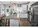 Bright and airy kitchen featuring stainless appliances, granite countertops, and island seating at 5016 Old Pine Ln, Cherryville, NC 28021